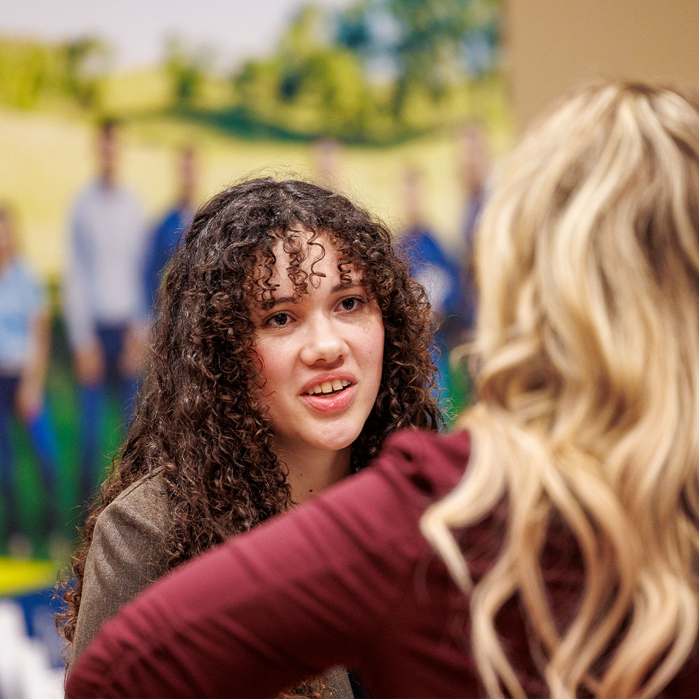 Two students talking.