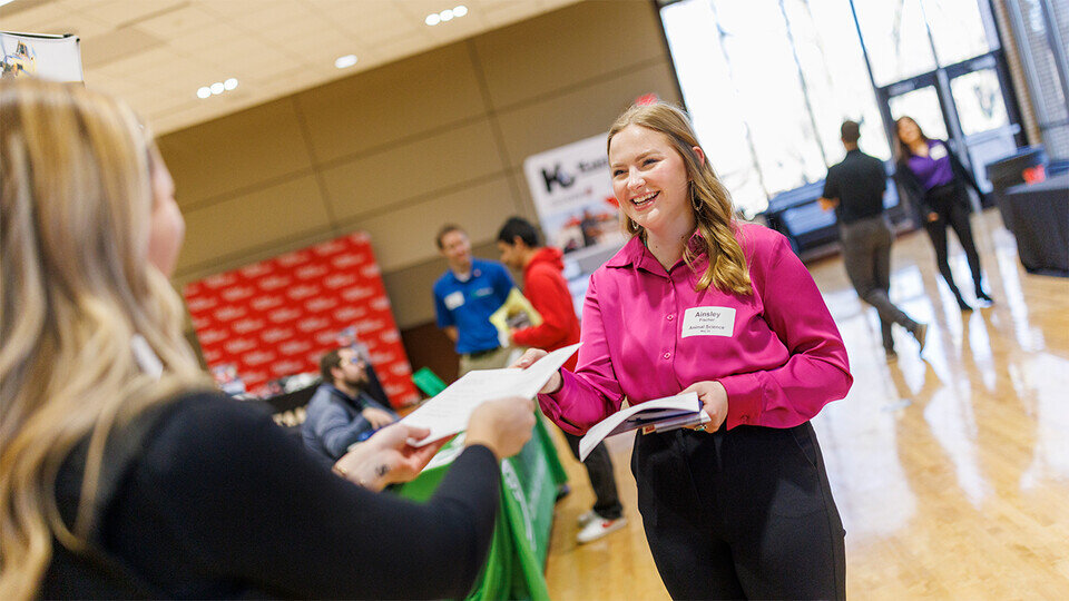 Student and employer interacting at the Spring 2024 career fair