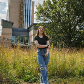 Marissa Lindemann in Hardin Hall prairie