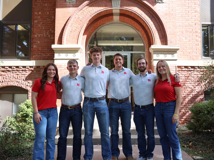 CASNR Peer Career Coaches posing for group picture in front of the Ag Communications Building