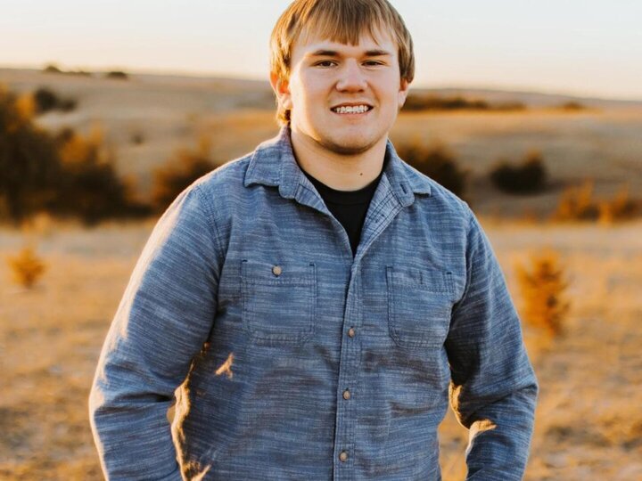 Chase Lewandowski, Agronomy and Horticulture Ambassador, poses for a picture in rural Nebraska