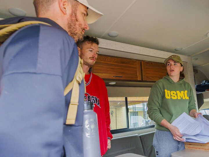 Members of UNL's Student Veterans of America discussing plans for a ruck march.