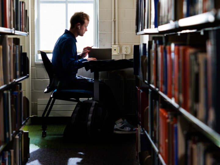 Student studying in library