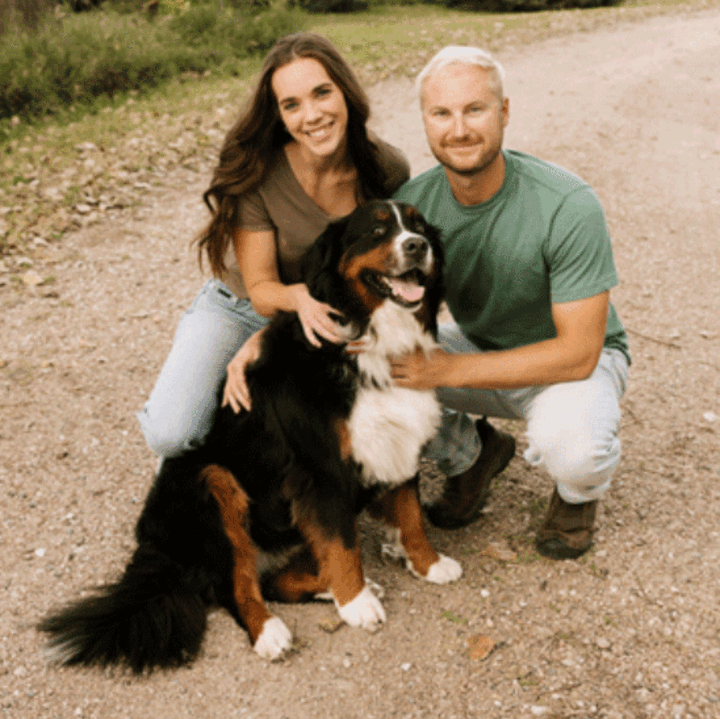 Logan Reed with wife and dog