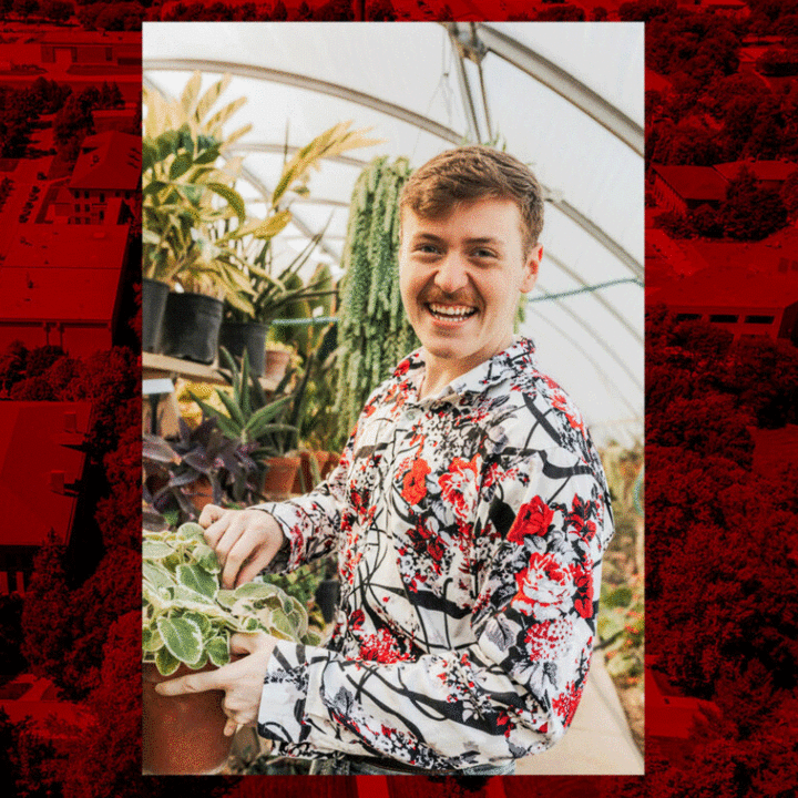 Trey Lamkins in greenhouse