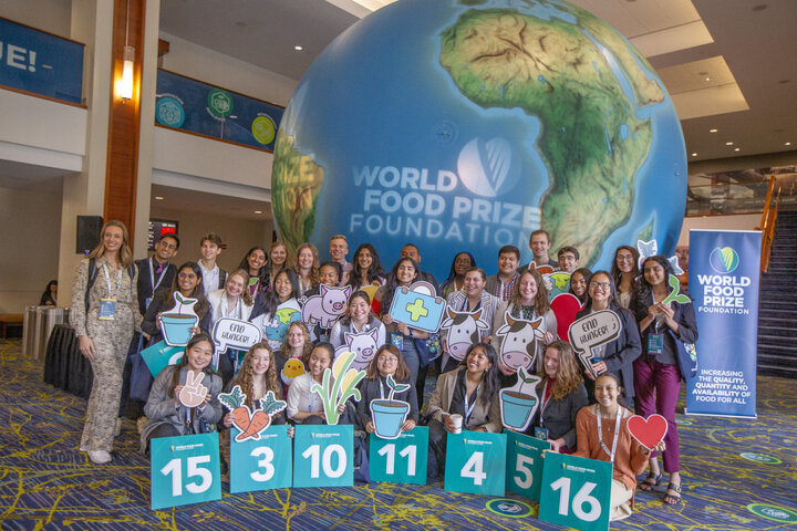 kids in front of a globe